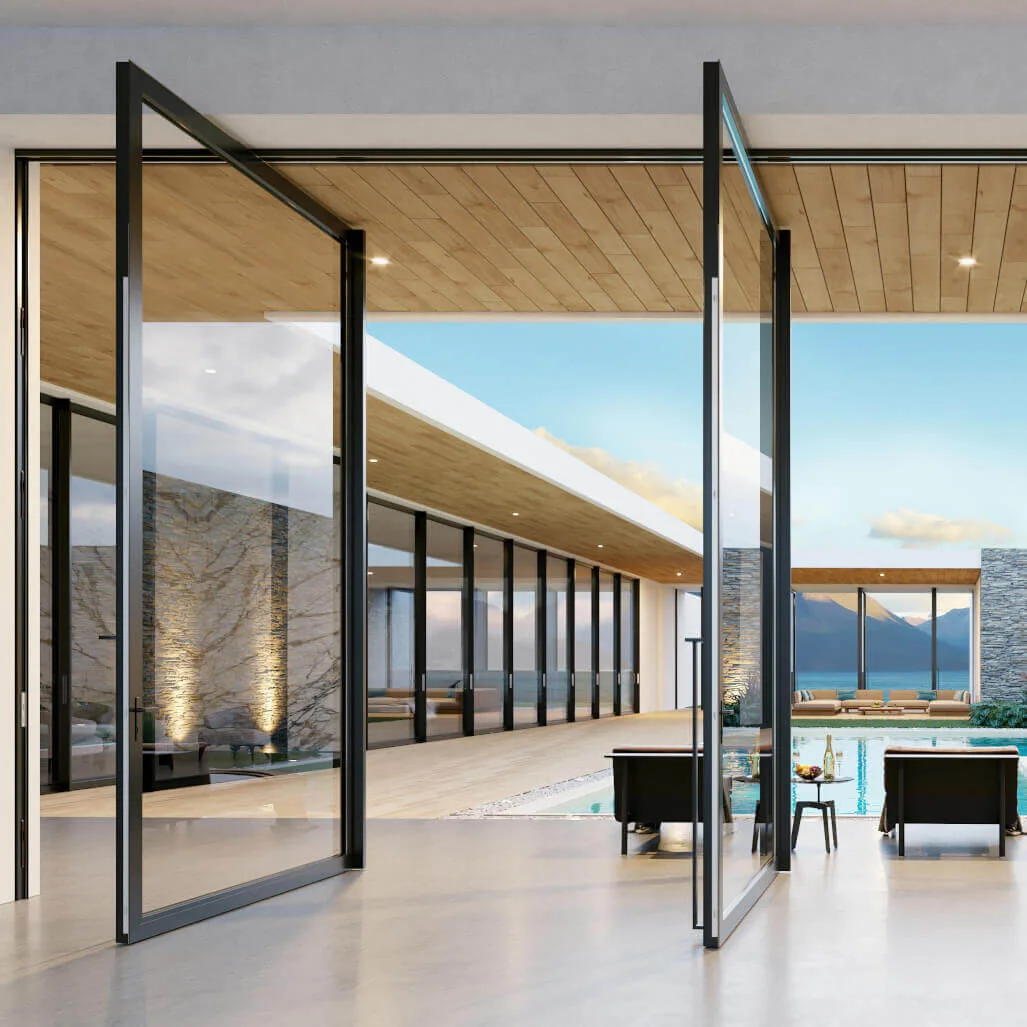 Full-height pivot doors opened from a living space onto a poolside terrace